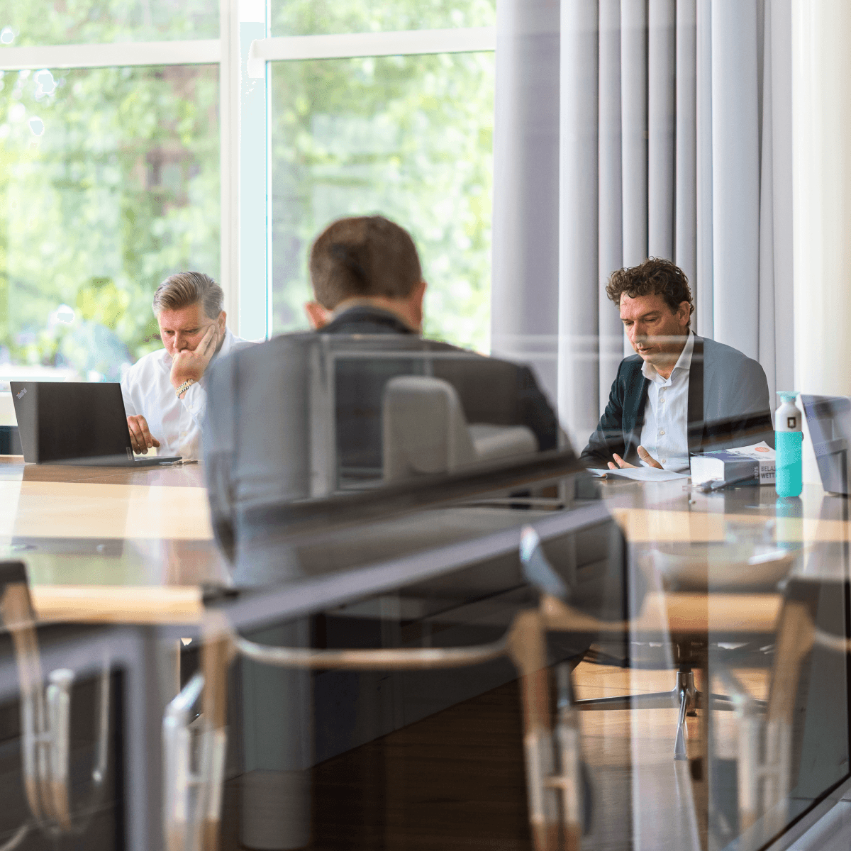 Business meeting large conference table HVK Stevens