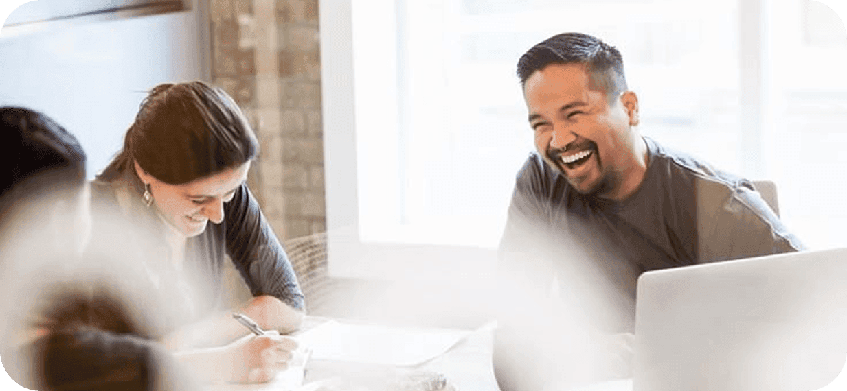 Team meeting collaboration laughing